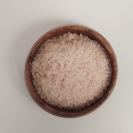 Video showing texture of bath salt and how it dissolves into water.